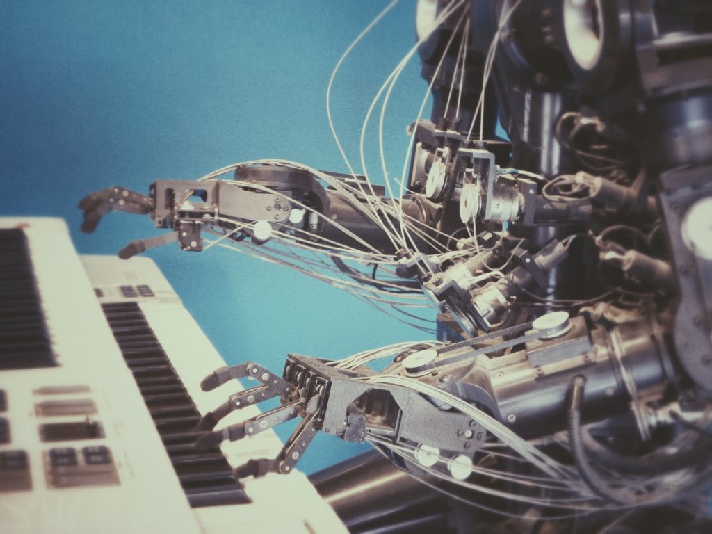 machine clicks, a robot playing a piano